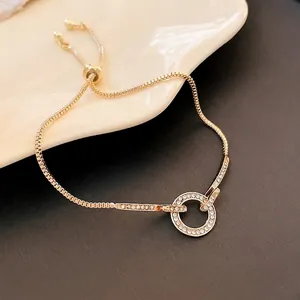 Elegant Gold Plated Alloy Bracelet For Women Featuring Minimalist Rhinestone Inlaid Round Ring Design Adjustable Link Chain Jewelry