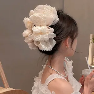 Large Korean style mesh hair claw clip in cream for elegant women's bun styling