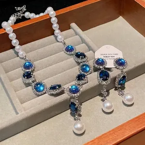 Elegant French vintage pearl and blue rhinestone necklace and earring jewelry set