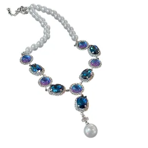 Elegant French retro pearl necklace with blue oval stones and crystal halo detail