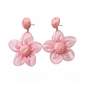 Elegant pink chiffon flower earrings with raffia center and silver needle posts.