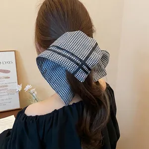 Elegant black and white gingham scarf hair tie for stylish ponytail hair accessory