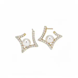 Elegant gold geometric star stud earrings with pavé crystals and round white center pearls