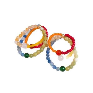 Handmade colorful natural stone beaded hoop earrings with vibrant dopamine aesthetic