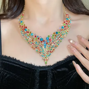Detailed view of a luxury vintage palace style necklace with colorful zircon leaves.