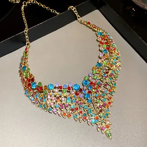 Macro detail of luxury vintage court style necklace with colorful zircon leaf fringe