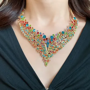 Detailed view of a vintage palace style necklace featuring colorful zircon leaves