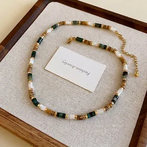 Ethnic handmade beaded necklace with shell and titanium steel accents for fashion jewelry