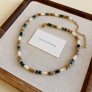 Detailed close-up showing the intricate shell and stone beads of this ethnic style necklace