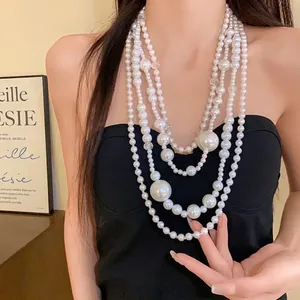 Elegant multi-layered irregular pearl necklace with bold retro design for women's fashion