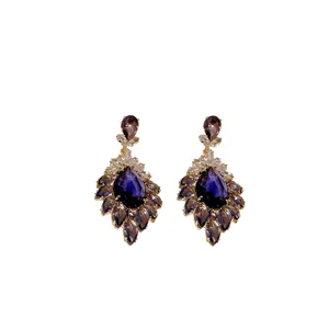Eleganti orecchini vintage a goccia con zirconi viola e perni in argento