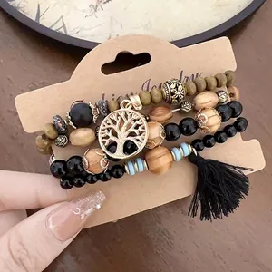 Bohemian stackable beaded bracelet set with Tree of Life charm and black tassel