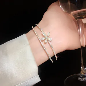 Elegant close-up view of a zircon flower double-layer open bracelet worn on a wrist