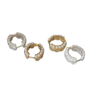 Elegant gold and silver hoop earrings with pearl accents and crown lace filigree design