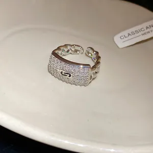 Elegant square zirconia pavé open ring with chain link design in shiny silver finish