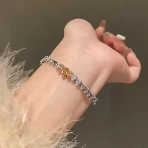 Detailed macro shot of luxury Korean style silver bracelet with champagne zircon stones