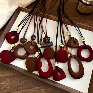 Vintage flocking velvet heart and round pendant necklaces in wine red and brown tones