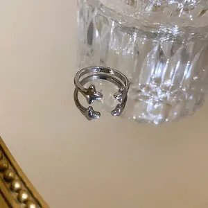 Elegant silver-tone star open ring with minimalist double-layer design and reflections