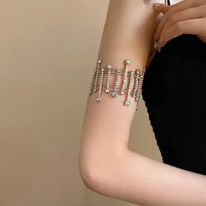 Detailed view of shimmering crystal geometric armlet on upper arm