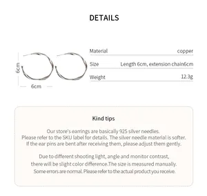 Detailed specifications of twisted hoop earrings showing 6cm diameter and material info