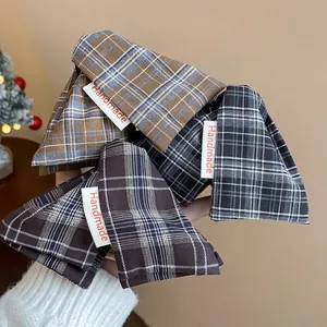 Set of vintage plaid fabric triangular shark hair clips with handmade label detail