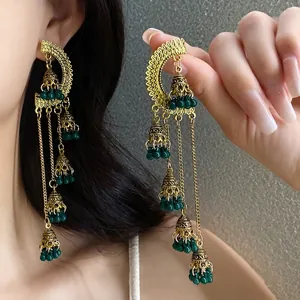 Vintage ethnic style gold tassel jhumka earrings with green beads and silver needle