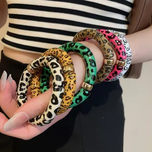 Stylish chunky acrylic leopard print stretch bracelet set with luxury gold metallic accents