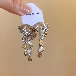 Elegant minimalist multi-layered fan-shaped drop earrings with a stylish silver finish