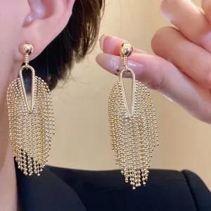 Elegant gold tassel fringe earrings with irregular vintage style and luxury finish