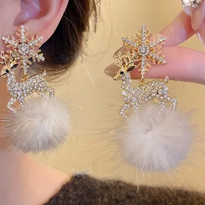Elegant Christmas reindeer and snowflake drop earrings with white fur balls and rhinestones