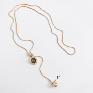 Collier pendentif œil de tigre style Maillard avec chaîne serpent dorée ajustable