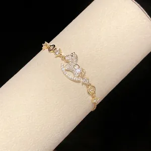 Elegant 14k gold plated bracelet featuring a sparkling zircon rocking horse pendant