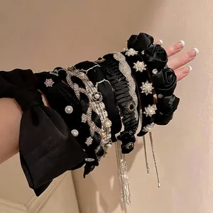 Collezione cerchietti velluto nero stile retrò con perle, pizzo e dettagli fiocco