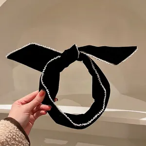 Cerchietto vintage in velluto nero con pizzo di perle ed elegante fiocco stile francese