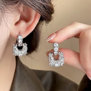 Silver plated zircon U-shaped hoop earrings featuring a unique niche luxury design.