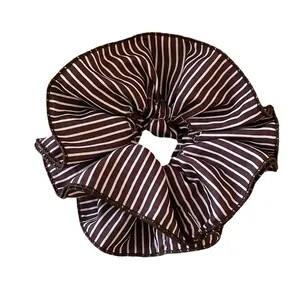 Elegant brown and white striped oversized fabric scrunchie hair tie for vintage ponytail styles