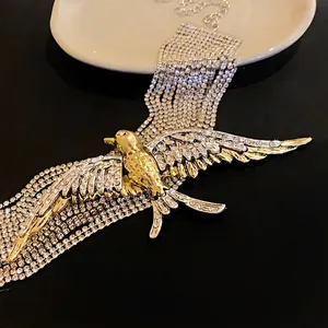 Elegante collana di strass a strati in stile francese con ciondolo a rondine dorata