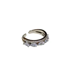 Elegante anello aperto minimalista con foglie di zircone e pietre scintillanti per donna.