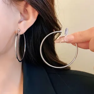 Minimalist large silver hoop ear clips for women stylish non-pierced earrings design
