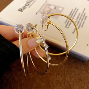 Elegant gold and silver minimalist circular hoop clip-on earrings for daily wear fashion