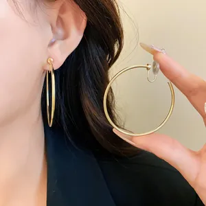 Minimalist large gold hoop clip-on earrings with comfort silicone pads for women