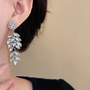Detailed view of elegant leaf wheat ear drop earrings with sparkling crystals