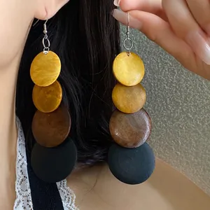Bohemian vintage multi-color wooden circle dangle earrings with silver hooks for women