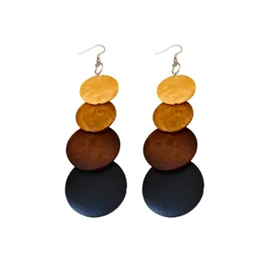 Vintage ethnic wooden drop earrings with gradient round discs and silver ear hooks.
