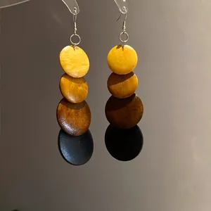 Ethnic style wooden earrings with four-layer gradient circular discs on silver hooks