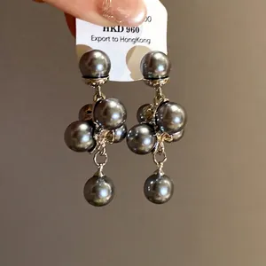 Elegant dark grey grape cluster pearl earrings featuring French retro palace style aesthetics