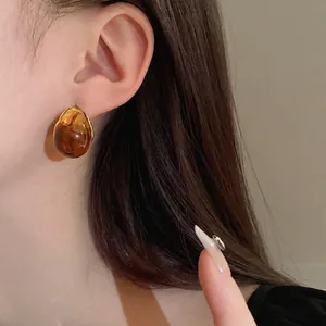 Vintage Maillard water drop geometric earrings with amber marble texture and gold frame