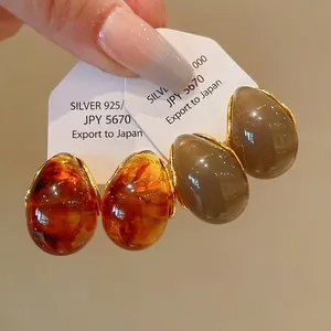 Vintage Maillard waterdrop earrings in amber and grey resin with silver needles