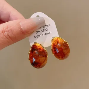 Elegant vintage amber waterdrop earrings featuring S925 silver needles Maillard style