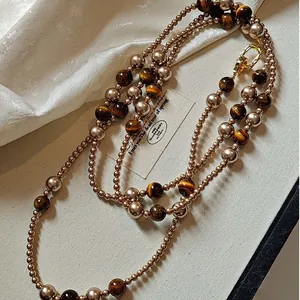 Elegante Vintage Perlenkette mit Tigerauge-Perlen für stilvolle Winter-Outfits